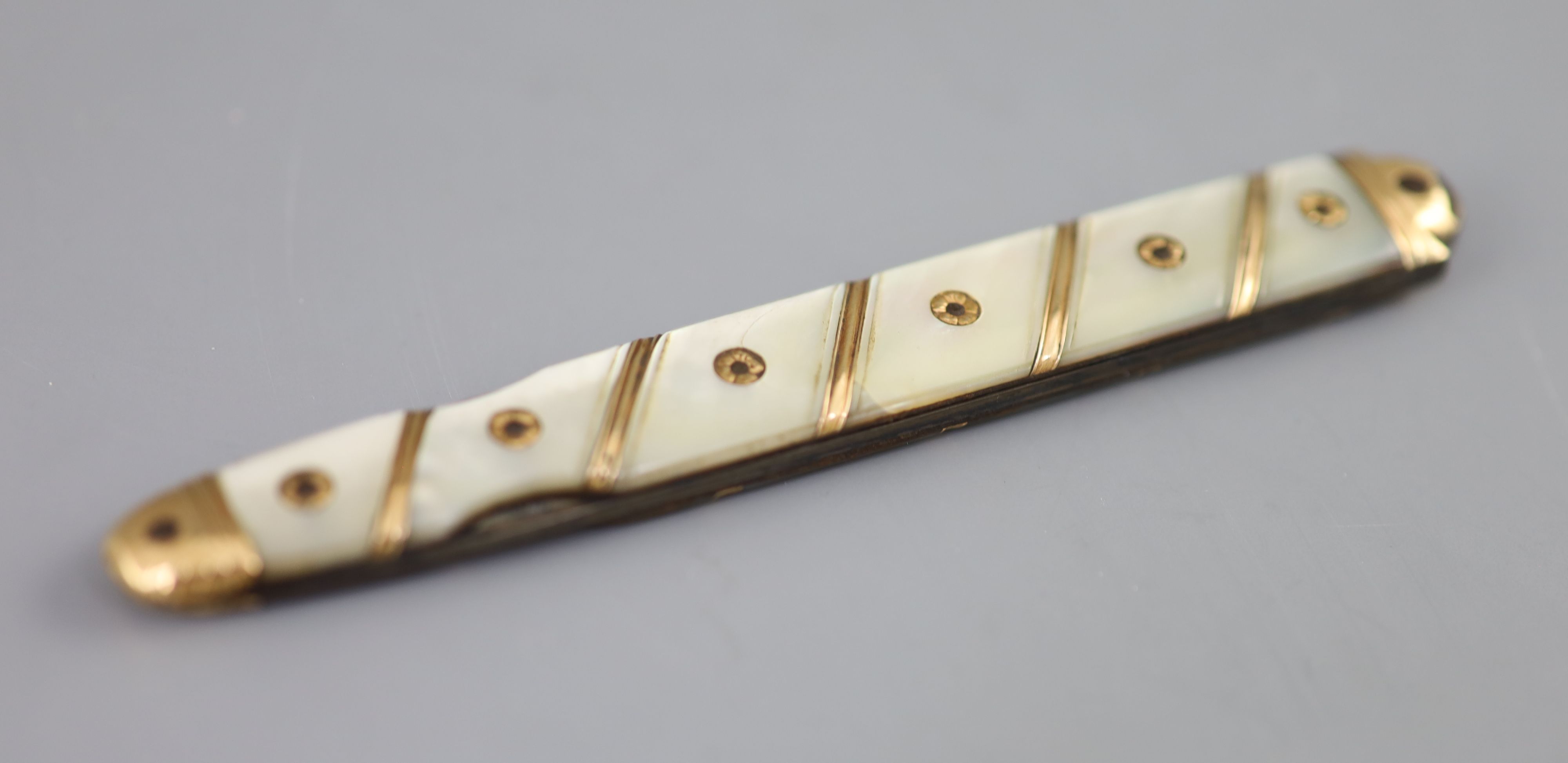 An early 19th century French? gold overlaid and mother of pearl mounted handled fruit/pocket knife,